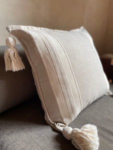 Putty gray striped artisan woven pillow with tassels